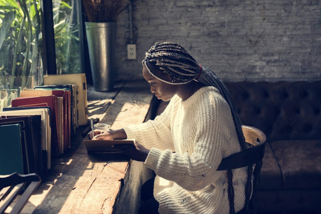 Portrait of black woman with dreadlocks hair