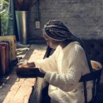 Portrait of black woman with dreadlocks hair